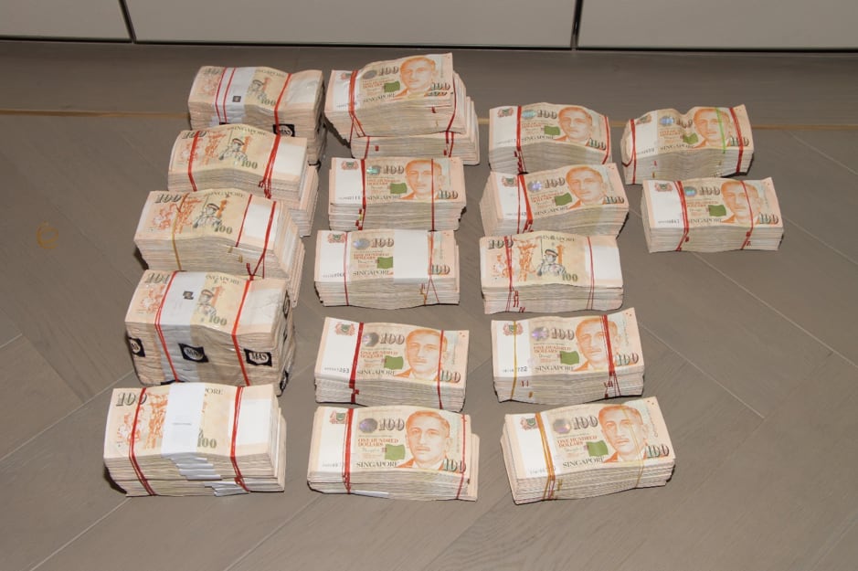 Cash seized by Singaporean police in August last year. Photocredit: Singapore Police Force