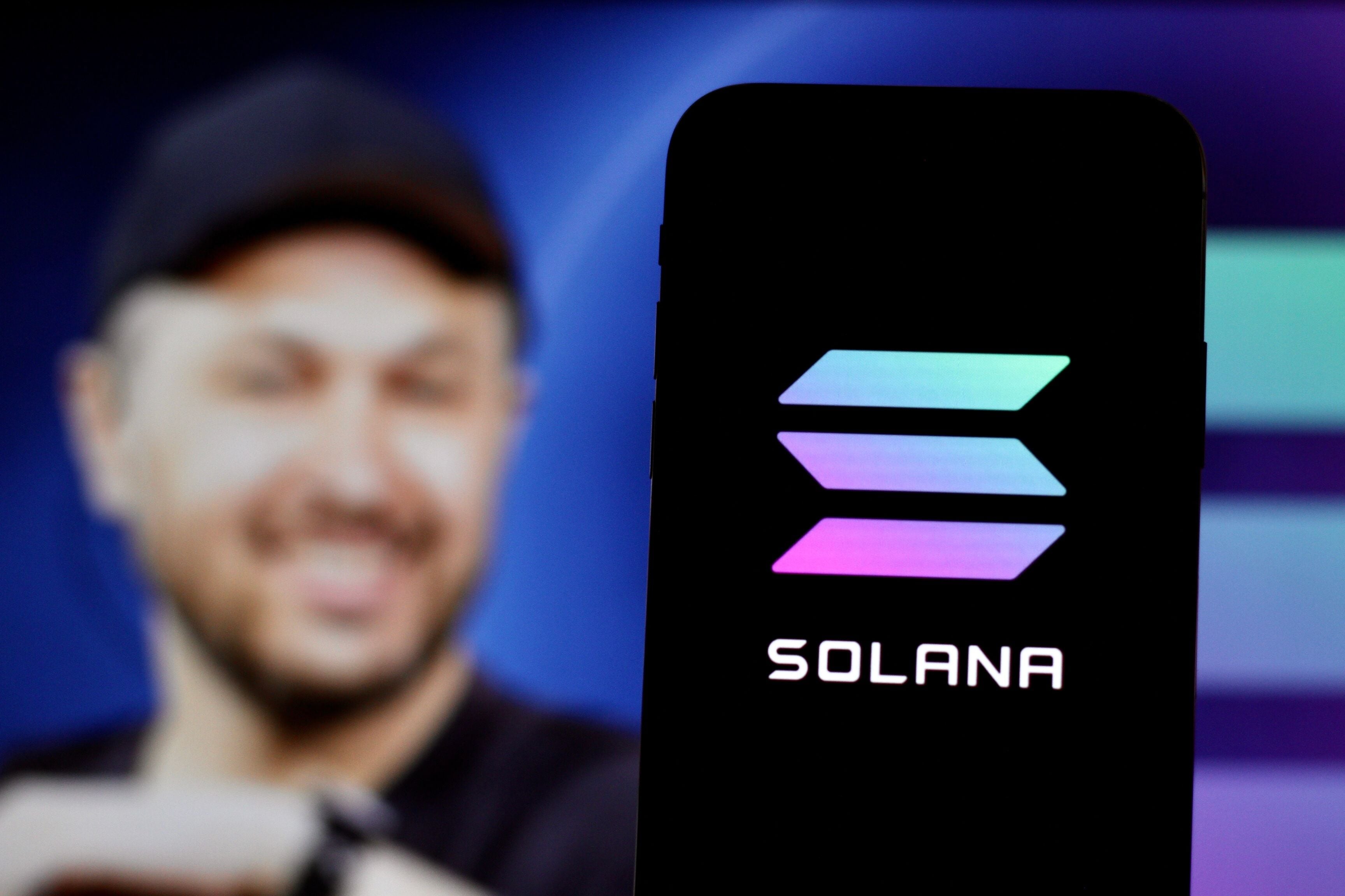 Solana CEO Anatoly Yakovenko appeared at an event in Indonesia in May with a mobile phone sporting the Solana logo. Photocredit: Muhammad Alimaki/ Shutterstock