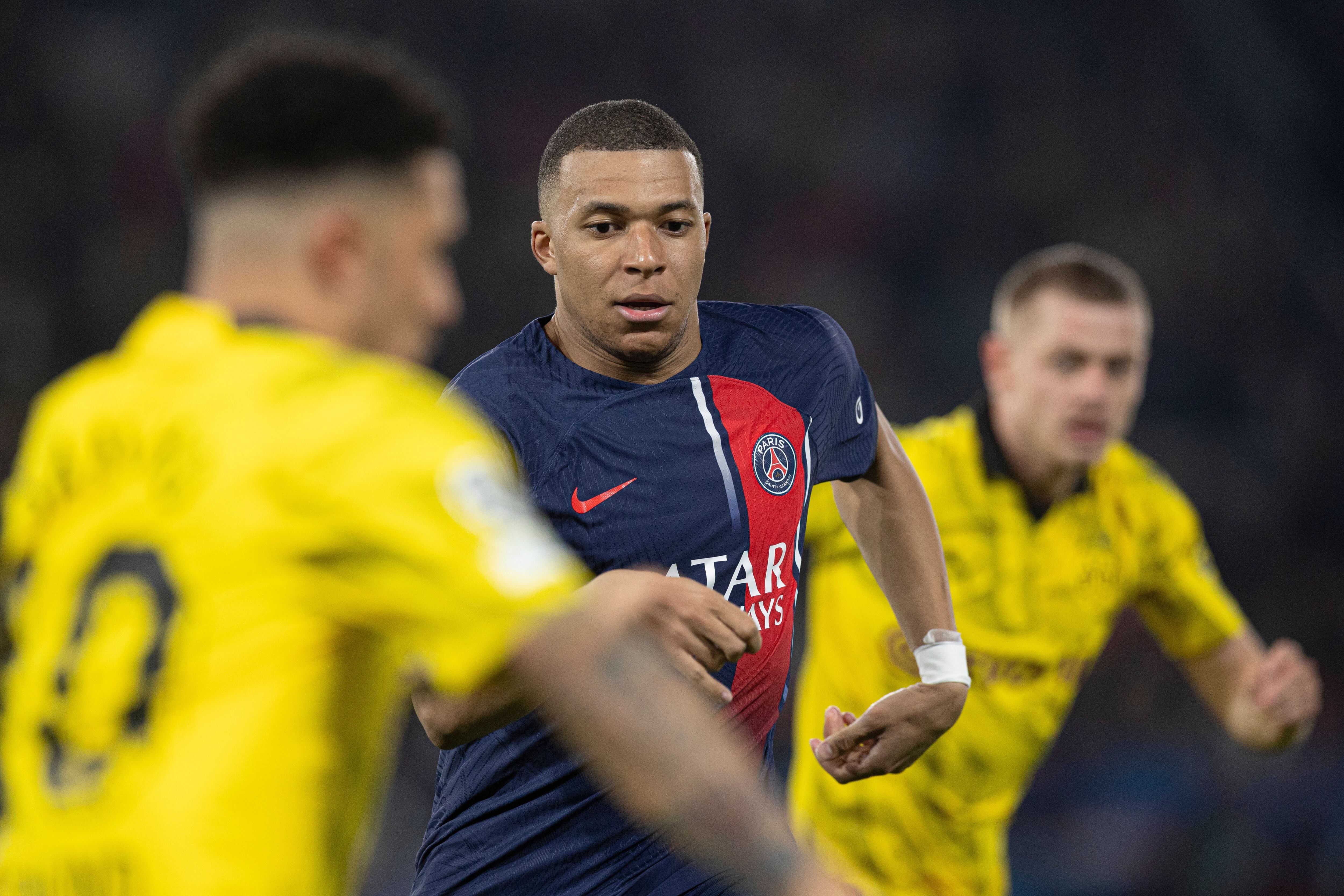 When PSG forward Kylian Mbappé (centre) failed to score against Borussia Dortmund on Tuesday the club's sports token suffered. Photo by Paul Currie/Shutterstock 